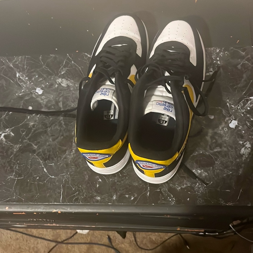 Nike Athletic Shoes in Black, White, and Yellow